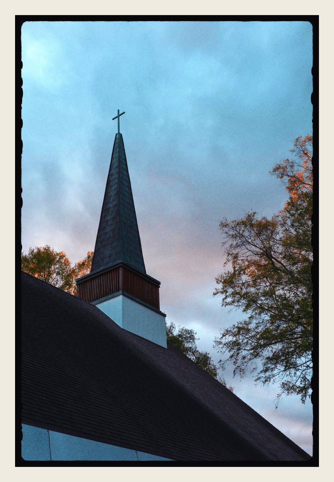 A church steeple in a Lantern edge on cream paper